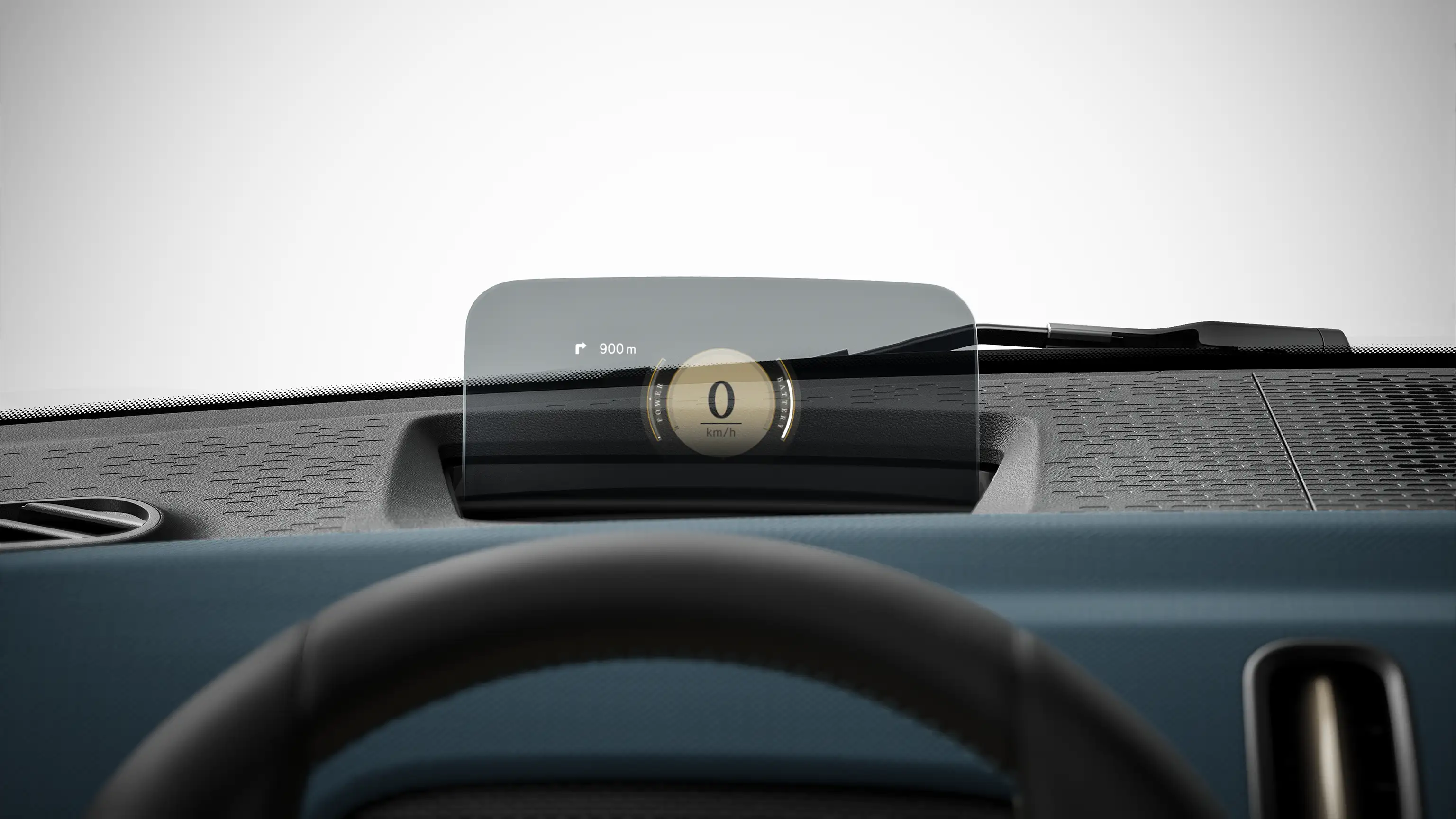 Head‑up display in a MINI showing speed and navigation guidance projected onto a transparent screen.